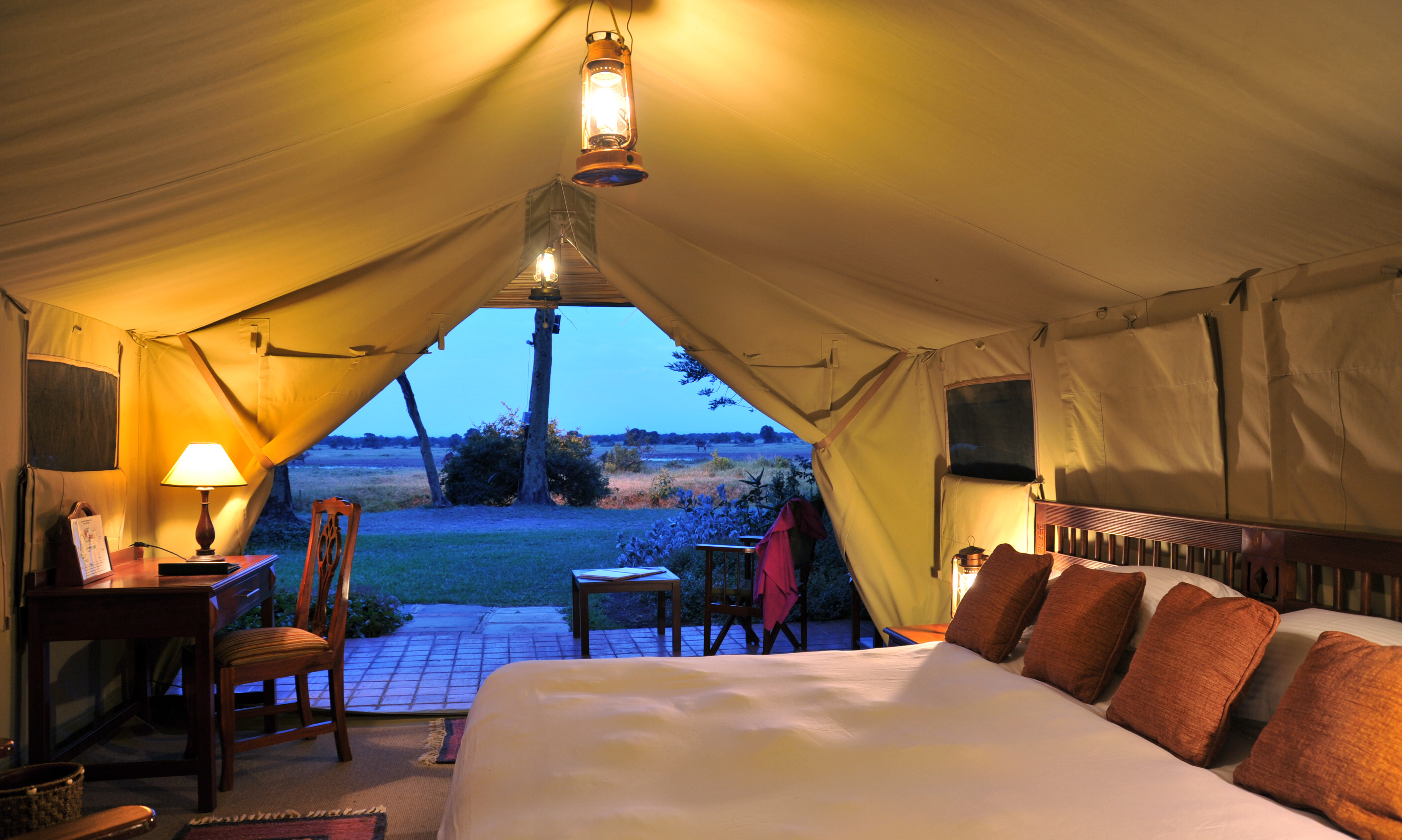 Sweetwaters Serena Camp standard wing tent with waterhole view